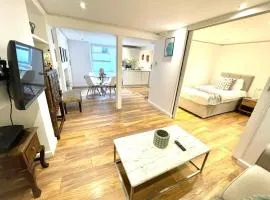 Historical Building - Cozy Basement Apartment- Central Location