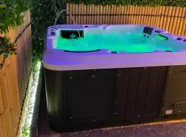 Appartement avec jaccuzi & jardin proche du centre
