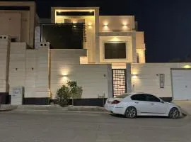 شقة مريحة صالة غرفتي نوم حديقة