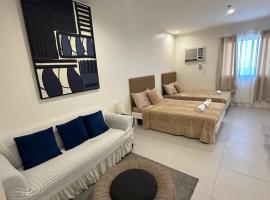 Serene Oaisis Condo with Netflix & WiFi, hotel com estacionamento em D&aacute;vao
