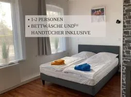 Haus Krabbe Zimmer ohne Küche, zentral gelegen zwischen Cuxhaven und Bremerhaven, Unterstellmöglichkeit für Fahrräder und E-Bikes, hauseigener Parkplatz, Hunde kostenfrei willkommen
