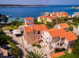 Apartments by the sea Banjol, Rab - 24825