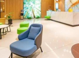 GreenTree Inn Jining Yanzhou Jiuzhou Fangyuan Business Hotel, hotel v Ťi-ningu