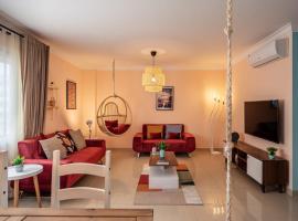 The 2BDR Compelling Condo 5 min to CAI Airport, hotel no Cairo
