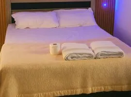 Quarto amplo no Portão