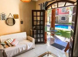 Apartamento Charmoso com Piscina Ampla e Natureza