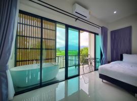 Sawaddee Pua Homestay(Cozy Home), hotel com banheiras de hidromassagem em Pua