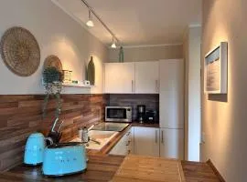 Sky & Sand Homes Oceans Drift I Wohnung unter Reet mit Terrasse am Ordinger Strand