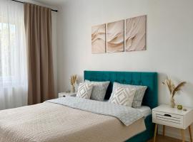 Emerald - Modern Central Apartment, Hotel in Tîrnăveni