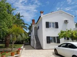 Villa Rosa with yard and children's playground