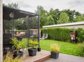 Gezellig chalet Hart van Zeeland met overdekt terras, tuin & zwembad VP086