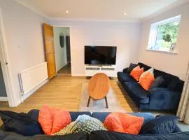 Spacious 5-Bedroom Home with Large Garden in Egham