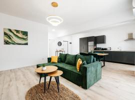 Premium Tulip Apartments, хотел в Tunarii