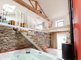 Loft d'architecte jacuzzi, cinema et filet habitation
