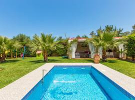 Eva & Dimitrios Villas, Captivating Oasis with Pools & BBQ, By ThinkVilla, hotel a Panormos Rethymno