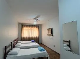 Apartamento 114 - Suíte em região central com ventilador