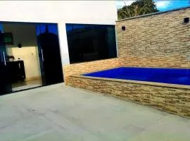 Conforto e Lazer! Casa com Piscina e 3 Quartos