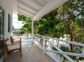 Laughing Bird 1BR #2 - Brand New Stylish Apartment, Pool, Beach condo