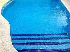Habitación,Piscina y Jardín