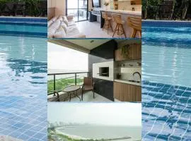 Apto Vista Mar 3 Quartos Ares Condicionados Cozinha Completa Piscina Academia Playground infantil Salão de Jogos a 50m PRAIA Reserve agora mesmo!