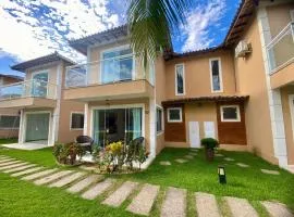 Casa com piscina em condomínio na Rasa