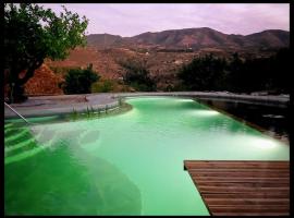 La calma entre naranjos, cort de lux din Melegis