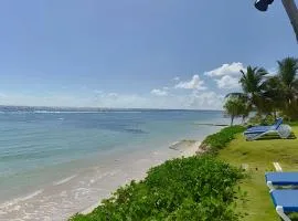 Caribbean Golden Sunset View,1BDRM Beachfront Apt.