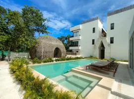 Tropical Escape in a Cozy Studio Paam Cheel