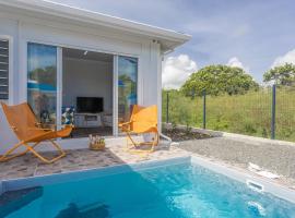 Domaine "Alizé Sainte-Marthe" - Idéal Couple & Famille - Piscine Privée - Clim - Mini Green de Golf - Wifi HD - Calme - 5min St-François Centre - Draps & Serviettes fournies, accessible hotel in Saint-François