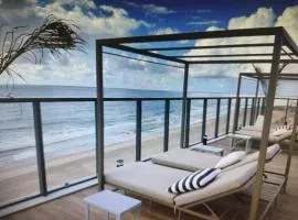 Studio beira mar próximo do centro de convenções em Armação