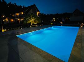 Dom Wypoczynkowy Simurg, h&ocirc;tel avec piscine &agrave; Mikoszewo