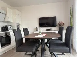 Ostfrieslands Perle Ferienwohnung an der Nordseeküste, Sauna, Terrasse, Garten, ruhige Lage, WLAN