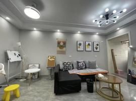Huainan Aisen Homestay Two Bedroom Apartment with Kitchen Elevator and Parking, alojamiento con cocina en Huainan