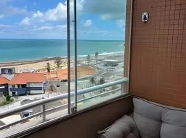 Flat praia a beira-mar