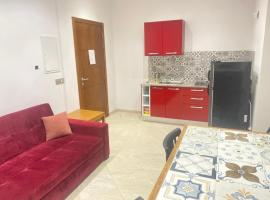Studio Rouge Cosy &agrave; Dar Lili Djerba, hotel na praia em Mezraya