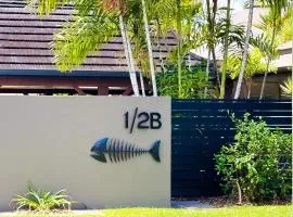 Fish on a Fence - Absolute Beachfront
