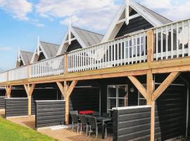 4 person holiday home in Blåvand-By Traum, hotell i Blåvand