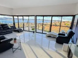 5 bed 3 bath Sandy Bay Retreat with Panoramic Sea Views