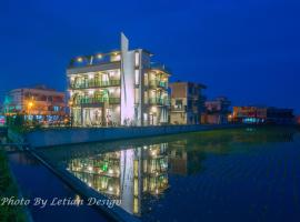 Colorful Fish Cottage, hotel en Zhuangwei