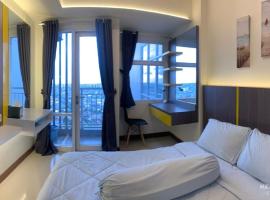 Apartemen VidaView Unit 26C By Millpro: Pampang şehrinde bir otel