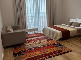 Апартаменты Aktau Rivera, hotel i Aktau