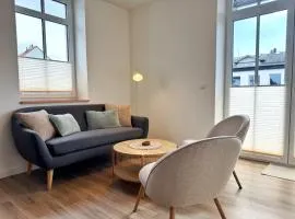 Hafenmeister Malte – Entspannt wohnen mit Balkon und Hafenflair