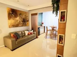 RefugioBacutia- Prédio FRENTE MAR Bacutia- 6 pessoas- 3 Quartos com AR sendo 1 suite - varanda- sala de estar e jantar Ampla -Piscina e Sauna no Prédio