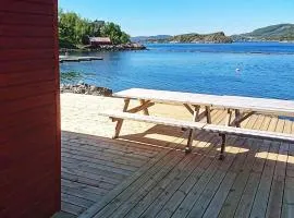 8 person holiday home in Revsnes