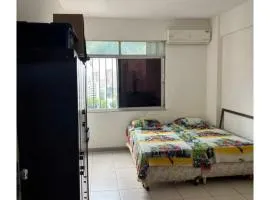 Quarto em área nobre central da cidade