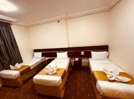 Dhakher Plaza Hotel - Free shuttle to and from the Haram, hotel a la Meca