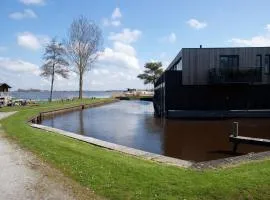 Charming Apartment in Langweer with Jetty