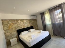 Guesthouse Luci, guest house in Ksamil