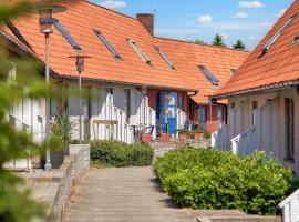 5 person holiday home on a holiday park in Gudhjem, penginapan layan diri di Gudhjem