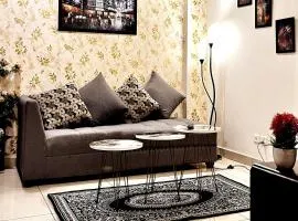 Luxe 1BHK Apartment with Pool and Sauna